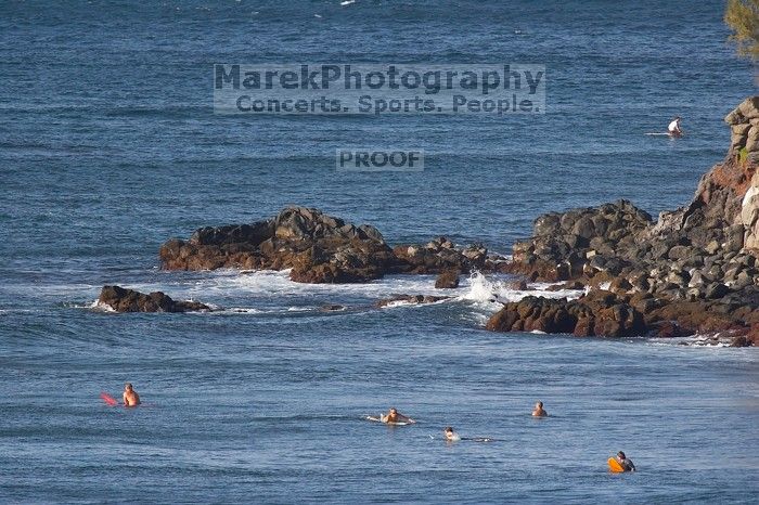 Surfers in Honolua Bay, Maui, Hawai'i, 2007.

Filename: SRM_20071217_1554103.jpg
Aperture: f/5.6
Shutter Speed: 1/1600
Body: Canon EOS 20D
Lens: Canon EF 300mm f/2.8 L IS