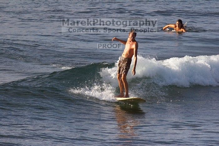 Surfers in Honolua Bay, Maui, Hawai'i, 2007.

Filename: SRM_20071217_1622449.jpg
Aperture: f/5.6
Shutter Speed: 1/1600
Body: Canon EOS 20D
Lens: Canon EF 300mm f/2.8 L IS