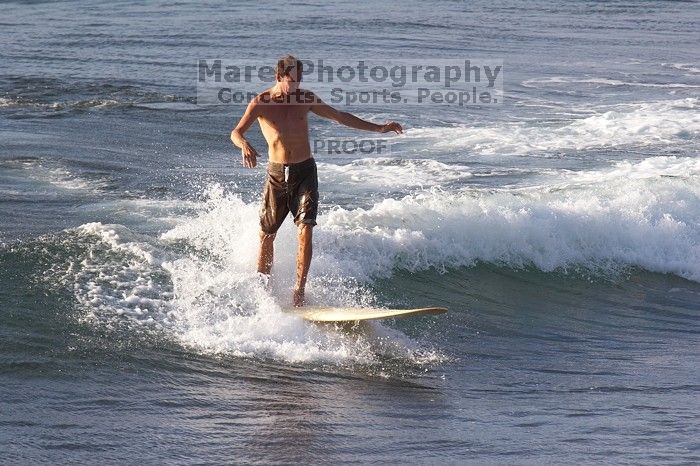Surfers in Honolua Bay, Maui, Hawai'i, 2007.

Filename: SRM_20071217_1623390.jpg
Aperture: f/5.6
Shutter Speed: 1/1250
Body: Canon EOS 20D
Lens: Canon EF 300mm f/2.8 L IS