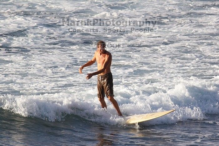 Surfers in Honolua Bay, Maui, Hawai'i, 2007.

Filename: SRM_20071217_1623422.jpg
Aperture: f/5.6
Shutter Speed: 1/2000
Body: Canon EOS 20D
Lens: Canon EF 300mm f/2.8 L IS