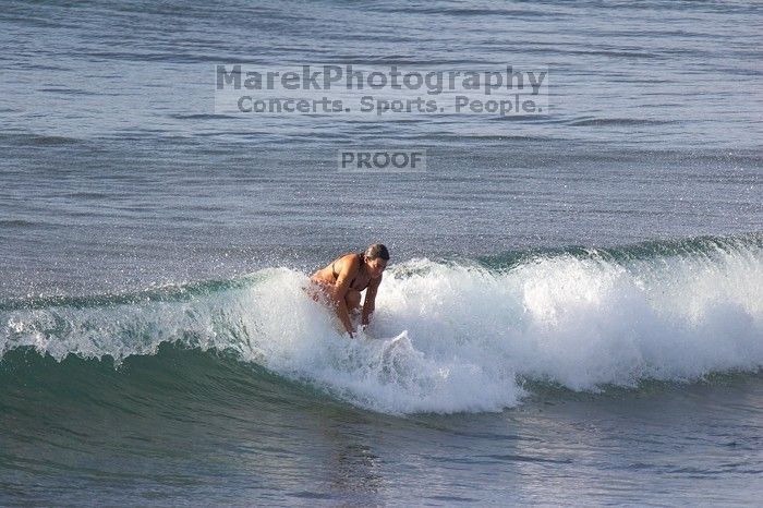 Surfers in Honolua Bay, Maui, Hawai'i, 2007.

Filename: SRM_20071217_1623465.jpg
Aperture: f/5.6
Shutter Speed: 1/1000
Body: Canon EOS 20D
Lens: Canon EF 300mm f/2.8 L IS