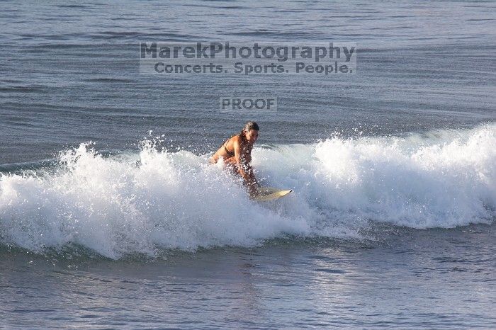 Surfers in Honolua Bay, Maui, Hawai'i, 2007.

Filename: SRM_20071217_1623466.jpg
Aperture: f/5.6
Shutter Speed: 1/1250
Body: Canon EOS 20D
Lens: Canon EF 300mm f/2.8 L IS
