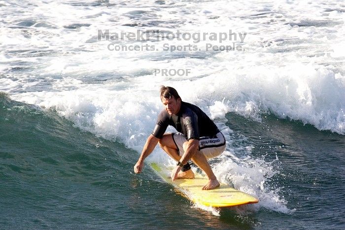 Surfers in Honolua Bay, Maui, Hawai'i, 2007.

Filename: SRM_20071217_1623571.jpg
Aperture: f/5.6
Shutter Speed: 1/1250
Body: Canon EOS 20D
Lens: Canon EF 300mm f/2.8 L IS