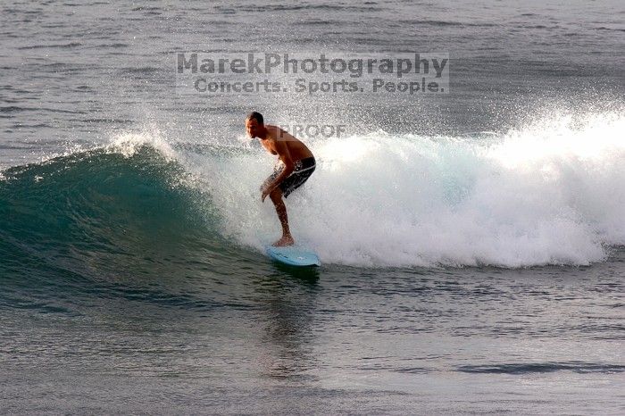 Surfers in Honolua Bay, Maui, Hawai'i, 2007.

Filename: SRM_20071217_1632574.jpg
Aperture: f/8.0
Shutter Speed: 1/1000
Body: Canon EOS 20D
Lens: Canon EF 300mm f/2.8 L IS