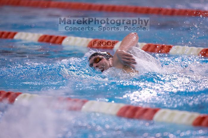UT junior Michael Klueh won the 1000 yard freestyle with a time of 9:01.89. The University of Texas Longhorns defeated The University of Georgia Bulldogs 157-135 on Saturday, January 12, 2008.
Filename: SRM_20080112_1111146.jpg
Aperture: f/2.8
Shutter Speed: 1/400
Body: Canon EOS-1D Mark II
Lens: Canon EF 300mm f/2.8 L IS