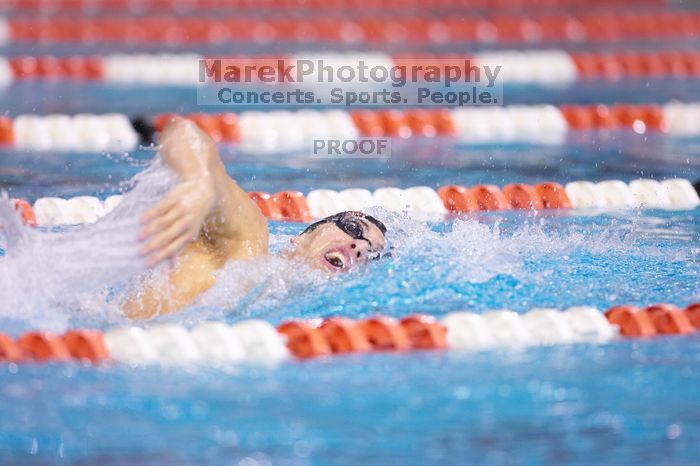 UT sophomore Ricky Berens won the 200 yard freestyle with a time of 1:37.56. The University of Texas Longhorns defeated The University of Georgia Bulldogs 157-135 on Saturday, January 12, 2008.
Filename: SRM_20080112_1118445.jpg
Aperture: f/2.8
Shutter Speed: 1/400
Body: Canon EOS-1D Mark II
Lens: Canon EF 300mm f/2.8 L IS