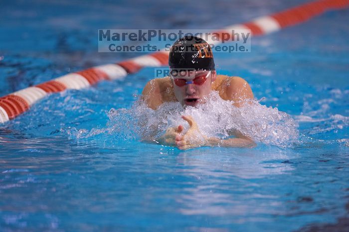 UT senior Agustin Magruder took second in the 100 yard breaststroke with a time of 56.67.  The University of Texas Longhorns defeated The University of Georgia Bulldogs 157-135 on Saturday, January 12, 2008.

Filename: SRM_20080112_1124545.jpg
Aperture: f/2.8
Shutter Speed: 1/400
Body: Canon EOS-1D Mark II
Lens: Canon EF 300mm f/2.8 L IS
