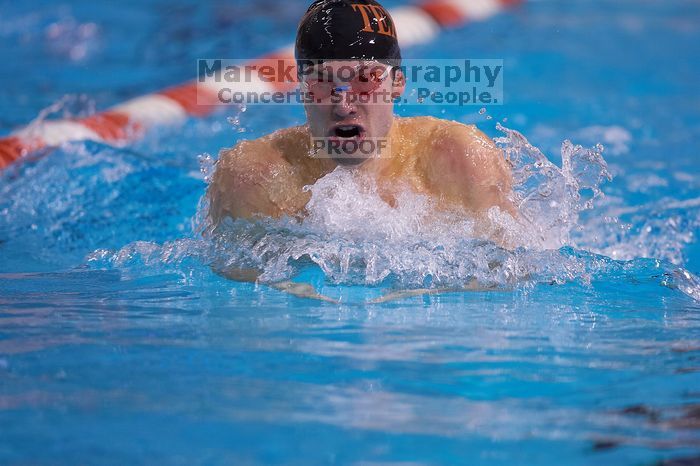 UT senior Agustin Magruder took second in the 100 yard breaststroke with a time of 56.67.  The University of Texas Longhorns defeated The University of Georgia Bulldogs 157-135 on Saturday, January 12, 2008.

Filename: SRM_20080112_1124588.jpg
Aperture: f/2.8
Shutter Speed: 1/400
Body: Canon EOS-1D Mark II
Lens: Canon EF 300mm f/2.8 L IS