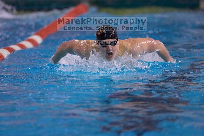 UT senior Christopher Seitz took second in the 200 yard butterfly with a time of 1:49.57. The University of Texas Longhorns defeated The University of Georgia Bulldogs 157-135 on Saturday, January 12, 2008.
Filename: SRM_20080112_1127442.jpg
Aperture: f/2.8
Shutter Speed: 1/400
Body: Canon EOS-1D Mark II
Lens: Canon EF 300mm f/2.8 L IS