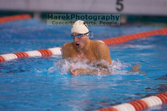 Georgia's Ashley Oliver was disqualified from the 200 yard breaststroke. The University of Texas Longhorns defeated The University of Georgia Bulldogs 157-135 on Saturday, January 12, 2008.
Filename: SRM_20080112_1200588.jpg
Aperture: f/2.8
Shutter Speed: 1/400
Body: Canon EOS-1D Mark II
Lens: Canon EF 300mm f/2.8 L IS