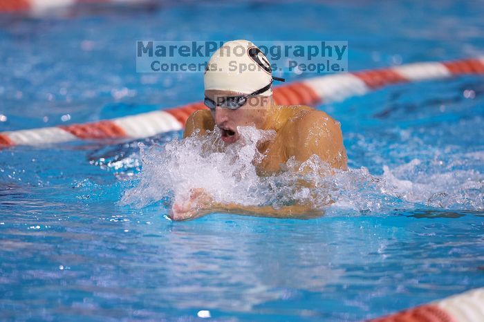 Georgia's Ashley Oliver was disqualified from the 200 yard breaststroke. The University of Texas Longhorns defeated The University of Georgia Bulldogs 157-135 on Saturday, January 12, 2008.
Filename: SRM_20080112_1201263.jpg
Aperture: f/2.8
Shutter Speed: 1/400
Body: Canon EOS-1D Mark II
Lens: Canon EF 300mm f/2.8 L IS