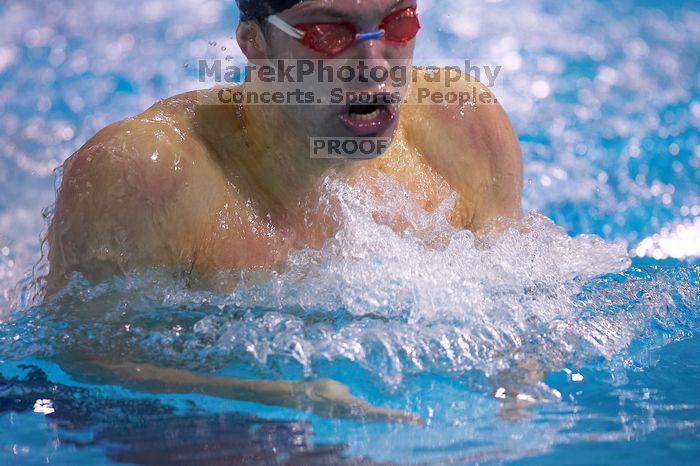 UT senior Matthew Lowe took first in the 200 yard breaststroke with a time of 2:01.46. The University of Texas Longhorns defeated The University of Georgia Bulldogs 157-135 on Saturday, January 12, 2008.
Filename: SRM_20080112_1202107.jpg
Aperture: f/2.8
Shutter Speed: 1/400
Body: Canon EOS-1D Mark II
Lens: Canon EF 300mm f/2.8 L IS