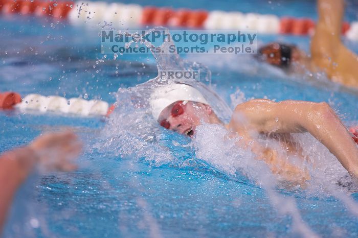 Georgia's Sebastien Rouault took second in the 500 yard freestyle with a time of 4:29.17.  The University of Texas Longhorns defeated The University of Georgia Bulldogs 157-135 on Saturday, January 12, 2008.

Filename: SRM_20080112_1204322.jpg
Aperture: f/2.8
Shutter Speed: 1/400
Body: Canon EOS-1D Mark II
Lens: Canon EF 300mm f/2.8 L IS