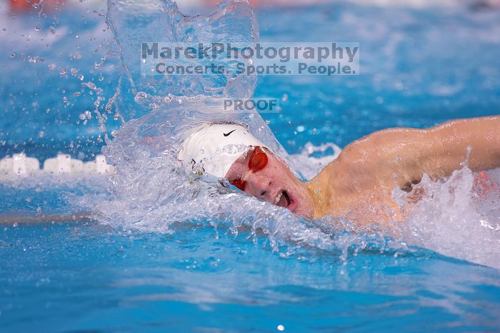 Georgia's Sebastien Rouault took second in the 500 yard freestyle with a time of 4:29.17. The University of Texas Longhorns defeated The University of Georgia Bulldogs 157-135 on Saturday, January 12, 2008.
Filename: SRM_20080112_1205003.jpg
Aperture: f/2.8
Shutter Speed: 1/400
Body: Canon EOS-1D Mark II
Lens: Canon EF 300mm f/2.8 L IS