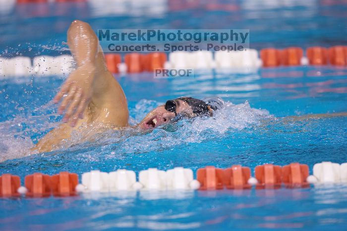 UT sophomore Ricky Berens took first in the 500 yard freestyle with a time of 4:27.92. The University of Texas Longhorns defeated The University of Georgia Bulldogs 157-135 on Saturday, January 12, 2008.
Filename: SRM_20080112_1206084.jpg
Aperture: f/2.8
Shutter Speed: 1/400
Body: Canon EOS-1D Mark II
Lens: Canon EF 300mm f/2.8 L IS