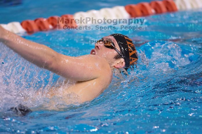 UT sophomore Trey Hoover competed in the 400 yard IM with a time of 4:10.06. The University of Texas Longhorns defeated The University of Georgia Bulldogs 157-135 on Saturday, January 12, 2008.
Filename: SRM_20080112_1238565.jpg
Aperture: f/2.8
Shutter Speed: 1/400
Body: Canon EOS-1D Mark II
Lens: Canon EF 300mm f/2.8 L IS