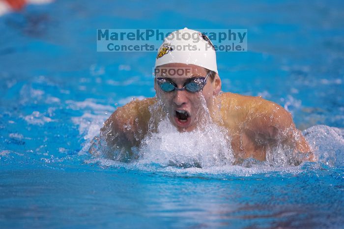 Georgia's Hunter Lainhart competed in the 400 yard IM with a time of 4:11.04. The University of Texas Longhorns defeated The University of Georgia Bulldogs 157-135 on Saturday, January 12, 2008.
Filename: SRM_20080112_1239422.jpg
Aperture: f/2.8
Shutter Speed: 1/400
Body: Canon EOS-1D Mark II
Lens: Canon EF 300mm f/2.8 L IS