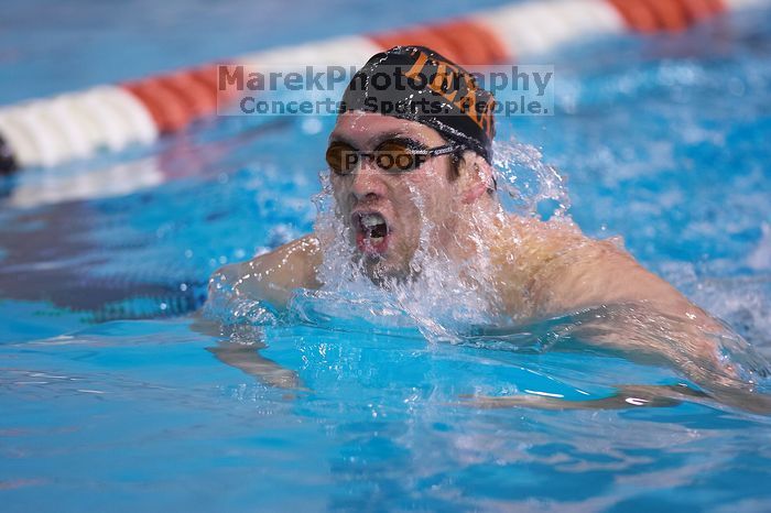 UT sophomore Trey Hoover competed in the 400 yard IM with a time of 4:10.06.  The University of Texas Longhorns defeated The University of Georgia Bulldogs 157-135 on Saturday, January 12, 2008.

Filename: SRM_20080112_1240003.jpg
Aperture: f/2.8
Shutter Speed: 1/400
Body: Canon EOS-1D Mark II
Lens: Canon EF 300mm f/2.8 L IS