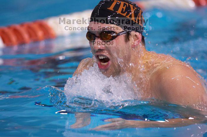 UT sophomore Trey Hoover competed in the 400 yard IM with a time of 4:10.06.  The University of Texas Longhorns defeated The University of Georgia Bulldogs 157-135 on Saturday, January 12, 2008.

Filename: SRM_20080112_1240067.jpg
Aperture: f/2.8
Shutter Speed: 1/400
Body: Canon EOS-1D Mark II
Lens: Canon EF 300mm f/2.8 L IS