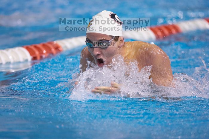 Georgia's Hunter Lainhart competed in the 400 yard IM with a time of 4:11.04.  The University of Texas Longhorns defeated The University of Georgia Bulldogs 157-135 on Saturday, January 12, 2008.

Filename: SRM_20080112_1240120.jpg
Aperture: f/2.8
Shutter Speed: 1/400
Body: Canon EOS-1D Mark II
Lens: Canon EF 300mm f/2.8 L IS