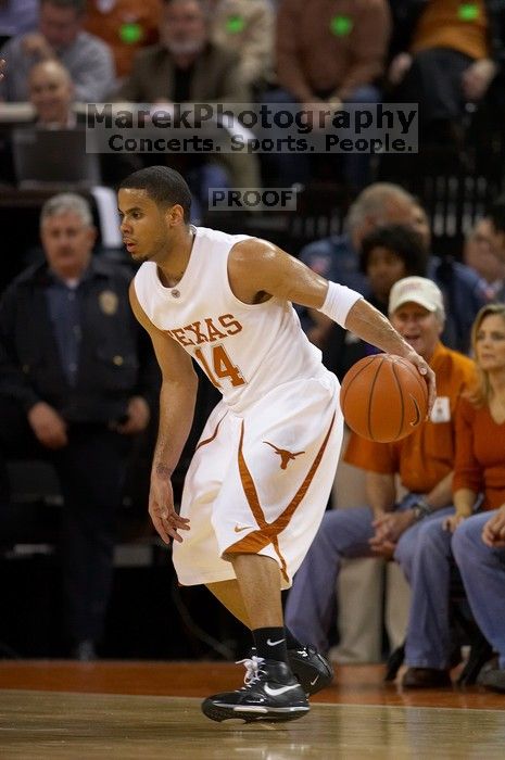 UT junior A.J. Abrams (#3, G) playing defense against a Kansas player. The University of Texas (UT) Longhorns defeated the University of Kansas Jayhawks 72-69 in Austin, Texas on Monday, February 11, 2008.
Filename: SRM_20080211_2036300.jpg
Aperture: f/2.8
Shutter Speed: 1/640
Body: Canon EOS 20D
Lens: Canon EF 300mm f/2.8 L IS