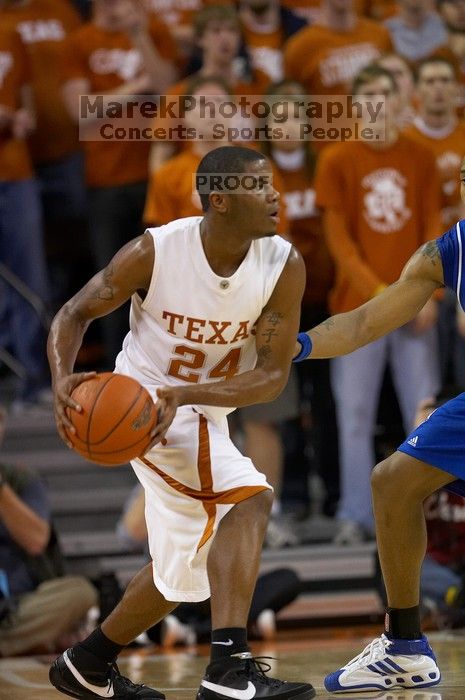 UT sophomore Justin Mason (#24, G). The University of Texas (UT) Longhorns defeated the University of Kansas Jayhawks 72-69 in Austin, Texas on Monday, February 11, 2008.
Filename: SRM_20080211_2052582.jpg
Aperture: f/2.8
Shutter Speed: 1/640
Body: Canon EOS 20D
Lens: Canon EF 300mm f/2.8 L IS
