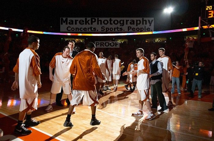 The University of Texas (UT) Longhorns defeated the University of Kansas Jayhawks 72-69 in Austin, Texas on Monday, February 11, 2008.
Filename: SRM_20080211_2108585.jpg
Aperture: f/2.8
Shutter Speed: 1/160
Body: Canon EOS DIGITAL REBEL
Lens: Canon EF 16-35mm f/2.8 L