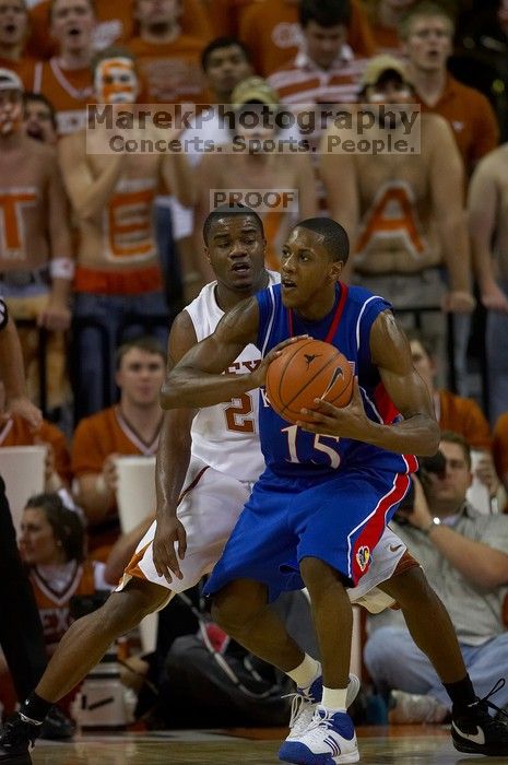 The University of Texas (UT) Longhorns defeated the University of Kansas Jayhawks 72-69 in Austin, Texas on Monday, February 11, 2008.

Filename: SRM_20080211_2137283.jpg
Aperture: f/2.8
Shutter Speed: 1/1000
Body: Canon EOS 20D
Lens: Canon EF 300mm f/2.8 L IS