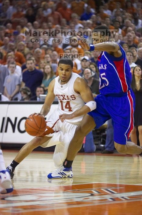 UT sophomore D.J. Augustin (#14, G) drives past KU junior Brandon Rush (#25, Guard) in the Kansas basketball game. The University of Texas (UT) Longhorns defeated the University of Kansas Jayhawks 72-69 in Austin, Texas on Monday, February 11, 2008.
Filename: SRM_20080211_2159147.jpg
Aperture: f/2.8
Shutter Speed: 1/640
Body: Canon EOS-1D Mark II
Lens: Canon EF 80-200mm f/2.8 L