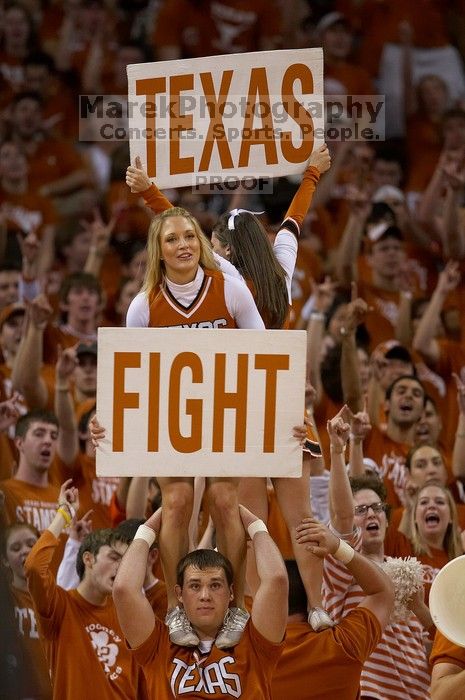Cheerleaders. The University of Texas (UT) Longhorns defeated the University of Kansas Jayhawks 72-69 in Austin, Texas on Monday, February 11, 2008.
Filename: SRM_20080211_2204127.jpg
Aperture: f/2.8
Shutter Speed: 1/640
Body: Canon EOS 20D
Lens: Canon EF 300mm f/2.8 L IS