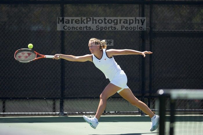 Fifth singles UT freshman Caroline Larsson defeated CSUS sophomore Aileen Tsan 6-2, 6-4.  The University of Texas defeated Sacramento State on Saturday, March 22, 2008.

Filename: SRM_20080322_1243520.jpg
Aperture: f/2.8
Shutter Speed: 1/2000
Body: Canon EOS-1D Mark II
Lens: Canon EF 300mm f/2.8 L IS