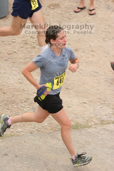 Beth Marek running The Saint trail race, sponsored by Rogue, at the Saint Stephen's Episcopal School on Sunday morning, June 29, 2008.

Filename: SRM_20080629_0731221.jpg
Aperture: f/4.0
Shutter Speed: 1/250
Body: Canon EOS 20D
Lens: Canon EF 80-200mm f/2.8 L