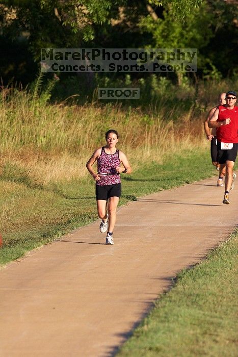 Beth Marek (bib #81) of Austin placed 4 in her age group (F 30-34) with an overall time of 01:46:51 at The Howdy Du duathlon in Berry Springs Park, Georgetown, Sunday July 6, 2008.

Filename: SRM_20080706_0730482.jpg
Aperture: f/4.0
Shutter Speed: 1/1250
Body: Canon EOS 20D
Lens: Canon EF 300mm f/2.8 L IS