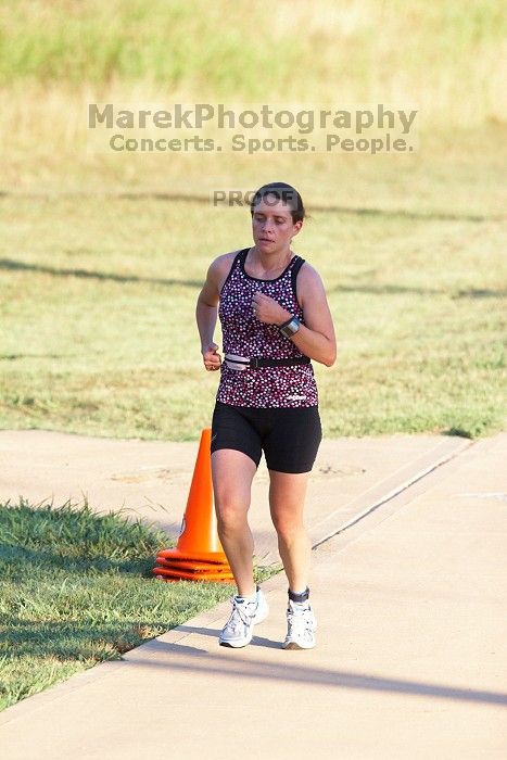 Beth Marek (bib #81) of Austin placed 4 in her age group (F 30-34) with an overall time of 01:46:51 at The Howdy Du duathlon in Berry Springs Park, Georgetown, Sunday July 6, 2008.

Filename: SRM_20080706_0730585.jpg
Aperture: f/4.0
Shutter Speed: 1/800
Body: Canon EOS 20D
Lens: Canon EF 300mm f/2.8 L IS