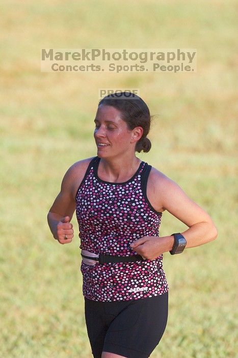 Beth Marek (bib #81) of Austin placed 4 in her age group (F 30-34) with an overall time of 01:46:51 at The Howdy Du duathlon in Berry Springs Park, Georgetown, Sunday July 6, 2008.

Filename: SRM_20080706_0731102.jpg
Aperture: f/4.0
Shutter Speed: 1/1000
Body: Canon EOS 20D
Lens: Canon EF 300mm f/2.8 L IS