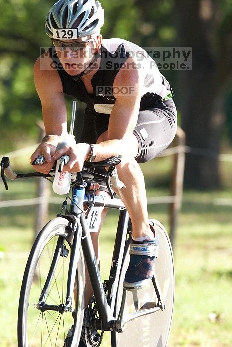 Thomas Miller (bib #129) of Austin placed 2 in his age group (M 30-34) with an overall time of 01:27:49 at The Howdy Du duathlon in Berry Springs Park, Georgetown, Sunday July 6, 2008.

Filename: SRM_20080706_0804525.jpg
Aperture: f/5.6
Shutter Speed: 1/640
Body: Canon EOS 20D
Lens: Canon EF 300mm f/2.8 L IS