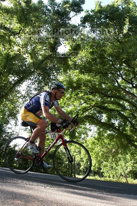 Chris Adolph (bib #131) of San Antonio placed 4 in his age group (M 0-39) with an overall time of 01:44:10 at The Howdy Du duathlon in Berry Springs Park, Georgetown, Sunday July 6, 2008.
Filename: SRM_20080706_0837580.jpg
Aperture: f/6.3
Shutter Speed: 1/1250
Body: Canon EOS 20D
Lens: Canon EF 16-35mm f/2.8 L