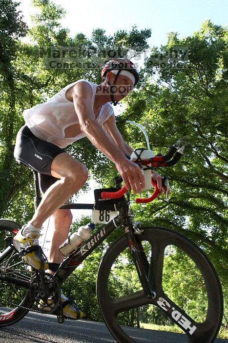 Richard Smith (bib #86) of Crowley placed 1 in his age group (M 55-59) with an overall time of 01:38:40 at The Howdy Du duathlon in Berry Springs Park, Georgetown, Sunday July 6, 2008.

Filename: SRM_20080706_0838081.jpg
Aperture: f/6.3
Shutter Speed: 1/1250
Body: Canon EOS 20D
Lens: Canon EF 16-35mm f/2.8 L