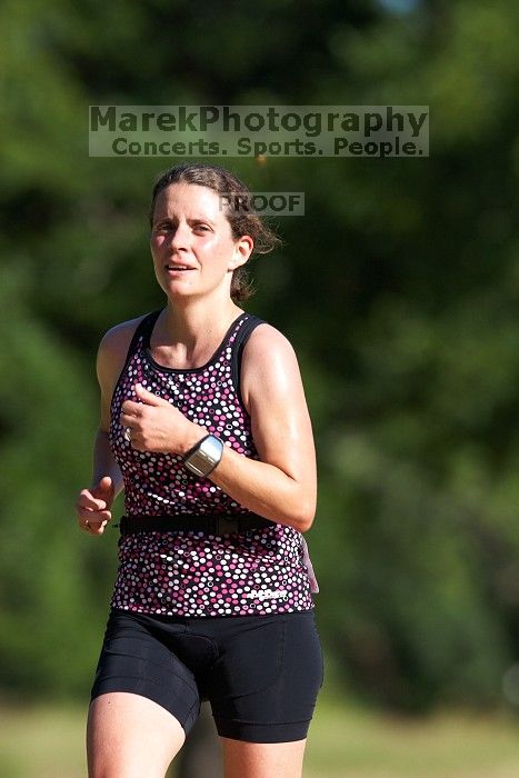 Beth Marek (bib #81) of Austin placed 4 in her age group (F 30-34) with an overall time of 01:46:51 at The Howdy Du duathlon in Berry Springs Park, Georgetown, Sunday July 6, 2008.

Filename: SRM_20080706_0855322.jpg
Aperture: f/4.0
Shutter Speed: 1/500
Body: Canon EOS 20D
Lens: Canon EF 300mm f/2.8 L IS