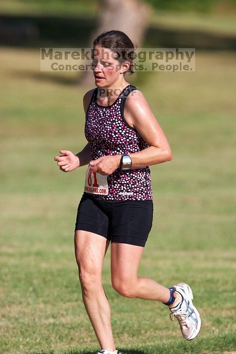 Beth Marek (bib #81) of Austin placed 4 in her age group (F 30-34) with an overall time of 01:46:51 at The Howdy Du duathlon in Berry Springs Park, Georgetown, Sunday July 6, 2008.

Filename: SRM_20080706_0907309.jpg
Aperture: f/4.0
Shutter Speed: 1/500
Body: Canon EOS 20D
Lens: Canon EF 300mm f/2.8 L IS