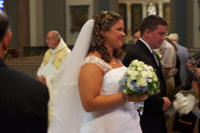Emily Marek and James Oyan's wedding ceremony at the Cathedral of the Sacred Heart, Saturday, July 12, 2008.

Filename: SRM_20080712_0841088.jpg
Aperture: f/3.5
Shutter Speed: 1/50
Body: Canon EOS-1D Mark II
Lens: Canon EF 50mm f/1.8 II
