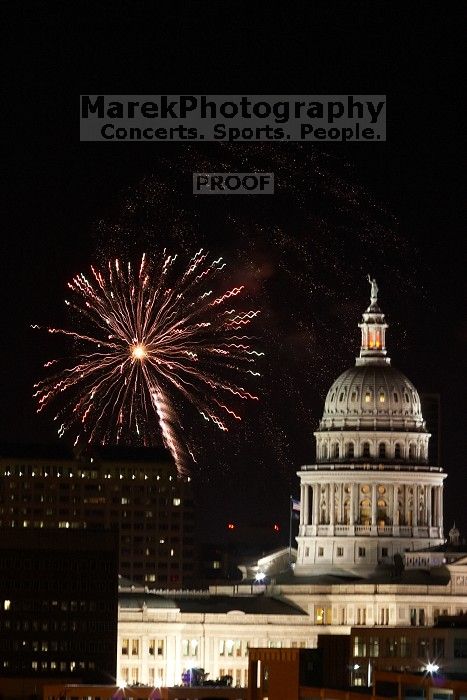 Austin Independence Day fireworks with the Capitol building, as viewed from atop the Manor Garage at The University of Texas at Austin. The fireworks were launched from Auditorium Shores, downtown Austin, Friday, July 4, 2008.
Filename: SRM_20080704_2144465.jpg
Aperture: f/11.0
Shutter Speed: 2/1
Body: Canon EOS 20D
Lens: Canon EF 80-200mm f/2.8 L
