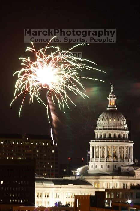Austin Independence Day fireworks with the Capitol building, as viewed from atop the Manor Garage at The University of Texas at Austin. The fireworks were launched from Auditorium Shores, downtown Austin, Friday, July 4, 2008.
Filename: SRM_20080704_2145328.jpg
Aperture: f/11.0
Shutter Speed: 5/1
Body: Canon EOS 20D
Lens: Canon EF 80-200mm f/2.8 L