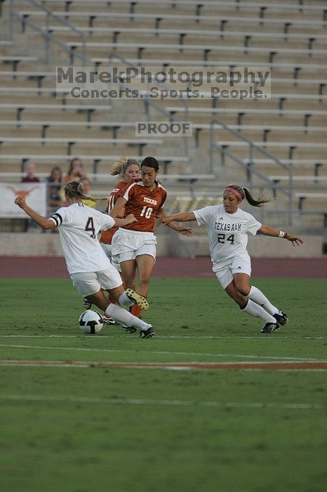 UT senior Stephanie Logterman (#10, Defender). The University of Texas women's soccer team tied 0-0 against the Texas A&M Aggies Friday night, September 27, 2008.
Filename: SRM_20080926_1908505.jpg
Aperture: f/4.0
Shutter Speed: 1/1000
Body: Canon EOS-1D Mark II
Lens: Canon EF 300mm f/2.8 L IS