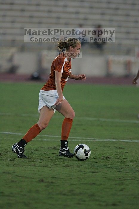 UT freshman Kylie Doniak (#15, Midfielder).  The University of Texas women's soccer team tied 0-0 against the Texas A&M Aggies Friday night, September 27, 2008.

Filename: SRM_20080926_1911100.jpg
Aperture: f/4.0
Shutter Speed: 1/800
Body: Canon EOS-1D Mark II
Lens: Canon EF 300mm f/2.8 L IS