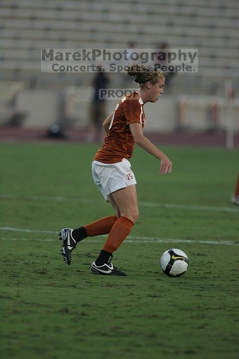 UT freshman Kylie Doniak (#15, Midfielder). The University of Texas women's soccer team tied 0-0 against the Texas A&M Aggies Friday night, September 27, 2008.
Filename: SRM_20080926_1911101.jpg
Aperture: f/4.0
Shutter Speed: 1/1000
Body: Canon EOS-1D Mark II
Lens: Canon EF 300mm f/2.8 L IS