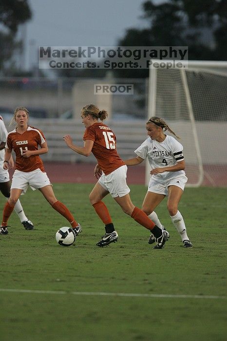 UT freshman Kylie Doniak (#15, Midfielder). The University of Texas women's soccer team tied 0-0 against the Texas A&M Aggies Friday night, September 27, 2008.
Filename: SRM_20080926_1911203.jpg
Aperture: f/4.0
Shutter Speed: 1/800
Body: Canon EOS-1D Mark II
Lens: Canon EF 300mm f/2.8 L IS