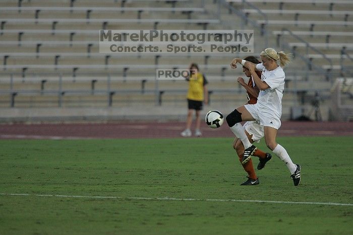UT senior Courtney Gaines (#23, Midfielder). The University of Texas women's soccer team tied 0-0 against the Texas A&M Aggies Friday night, September 27, 2008.
Filename: SRM_20080926_1914249.jpg
Aperture: f/4.0
Shutter Speed: 1/800
Body: Canon EOS-1D Mark II
Lens: Canon EF 300mm f/2.8 L IS