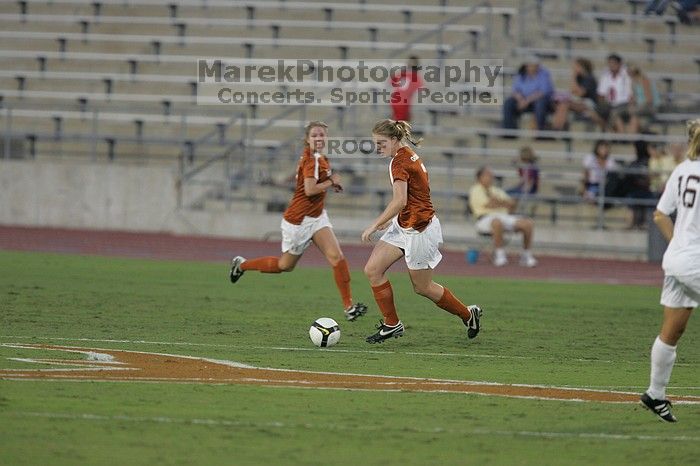 UT freshman Courtney Goodson (#7, Forward and Midfielder). The University of Texas women's soccer team tied 0-0 against the Texas A&M Aggies Friday night, September 27, 2008.
Filename: SRM_20080926_1924181.jpg
Aperture: f/4.0
Shutter Speed: 1/400
Body: Canon EOS-1D Mark II
Lens: Canon EF 300mm f/2.8 L IS