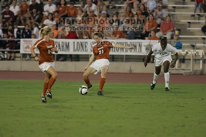 UT junior Emily Anderson (#21, Forward). The University of Texas women's soccer team tied 0-0 against the Texas A&M Aggies Friday night, September 27, 2008.
Filename: SRM_20080926_1930286.jpg
Aperture: f/4.0
Shutter Speed: 1/400
Body: Canon EOS-1D Mark II
Lens: Canon EF 300mm f/2.8 L IS